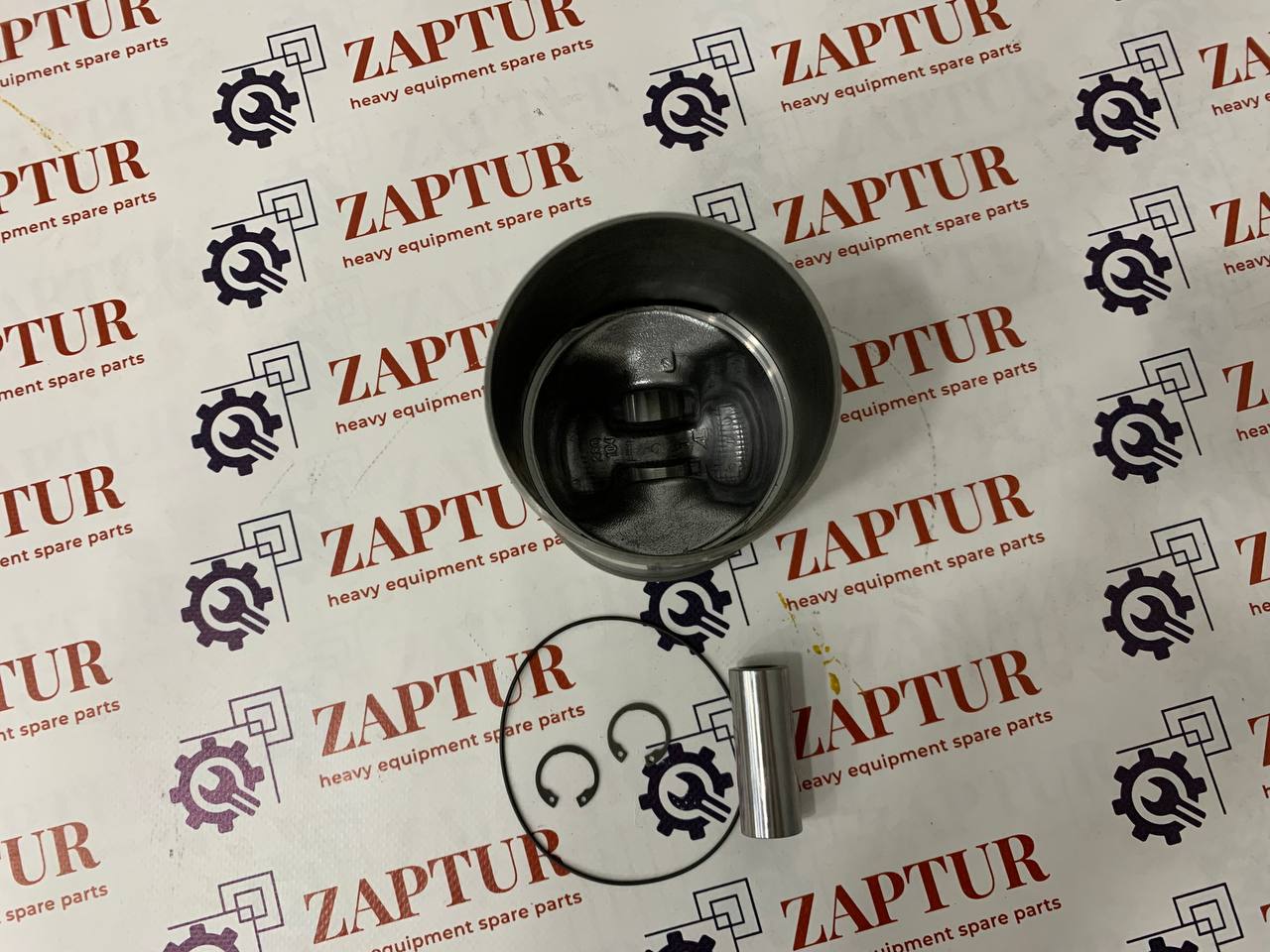 Piston and cylinder liner